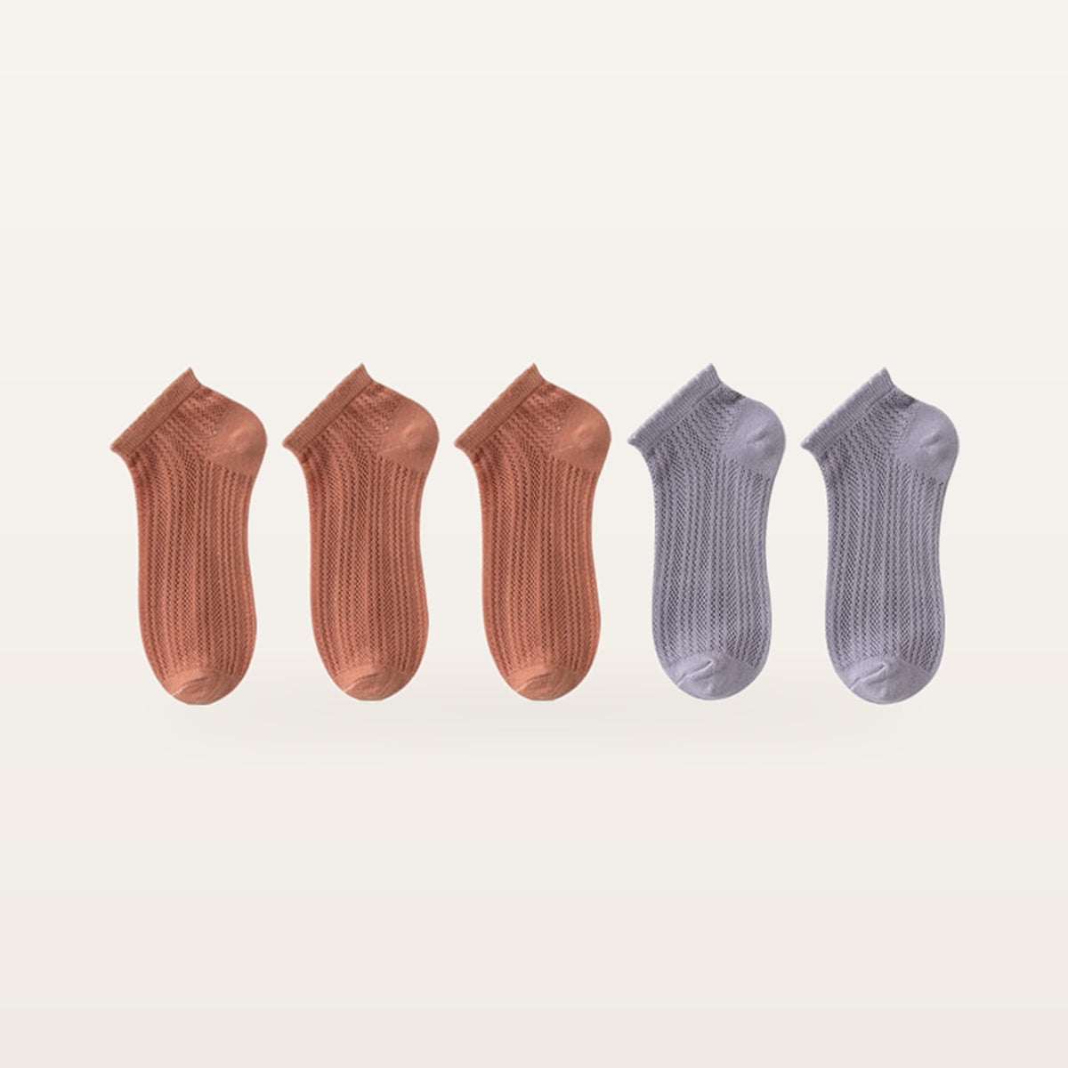 Assortiment de cinq paires de socquettes en maille ajourée : trois paires terracotta et deux parme