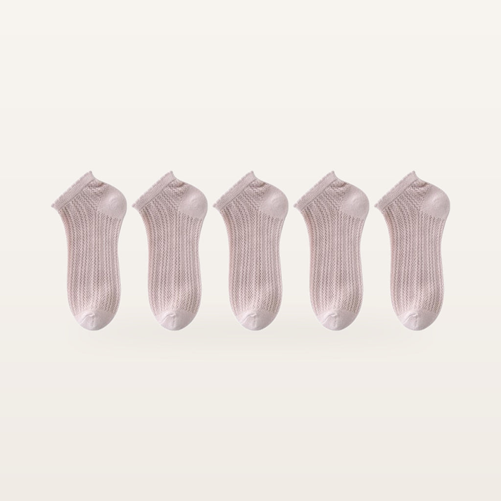 Lot de cinq paires de socquettes rose poudré en maille ajourée