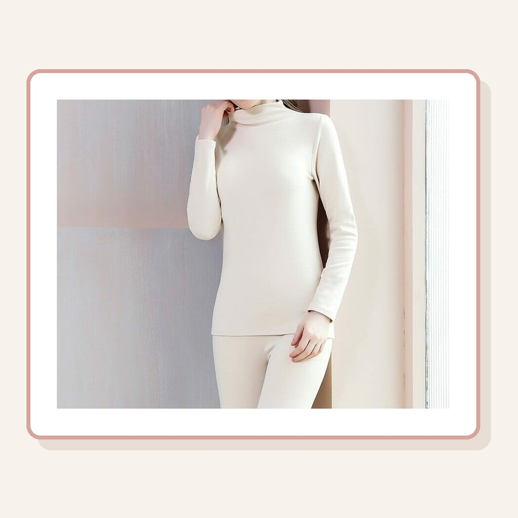 Sous-vêtement thermique femme col roulé blanc, haut manches longues et pantalon assorti