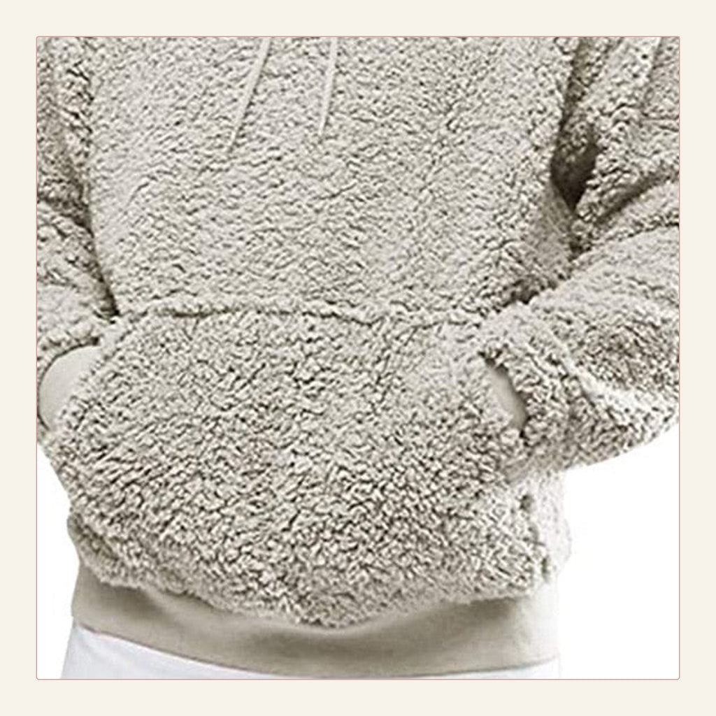 Détail réel de la poche kangourou du sweat à capuche peluche gris