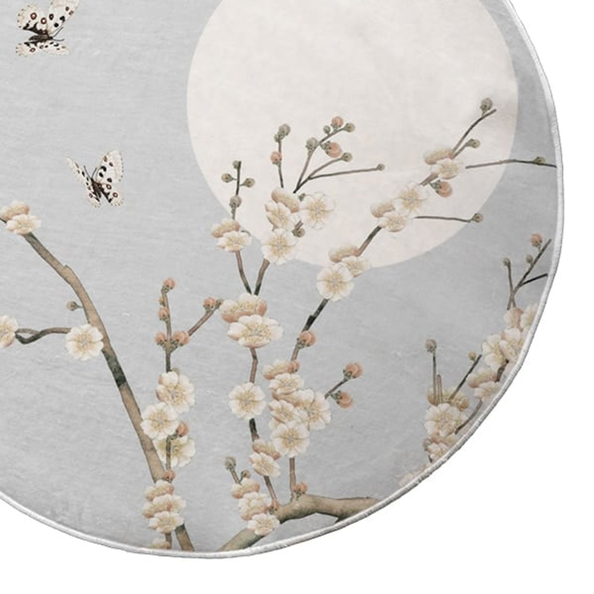Détail du tapis gris, fleurs, papillons et disque clair