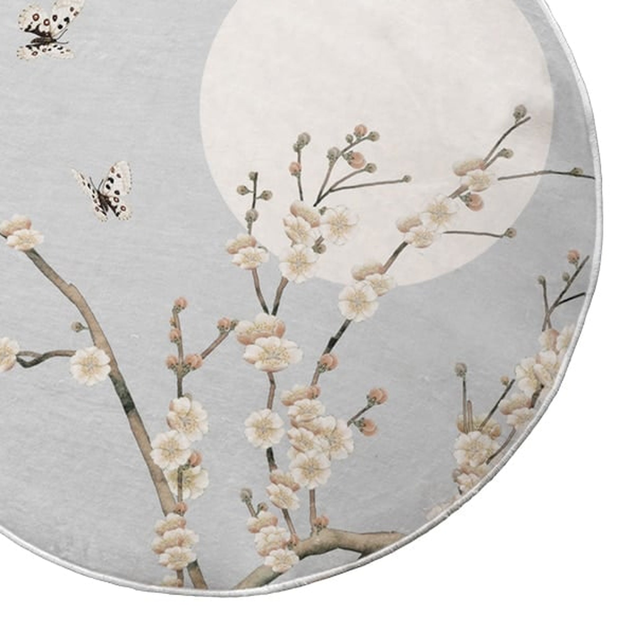Détail du tapis rond gris avec fleurs et papillons Image