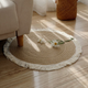 Tapis rond à franges