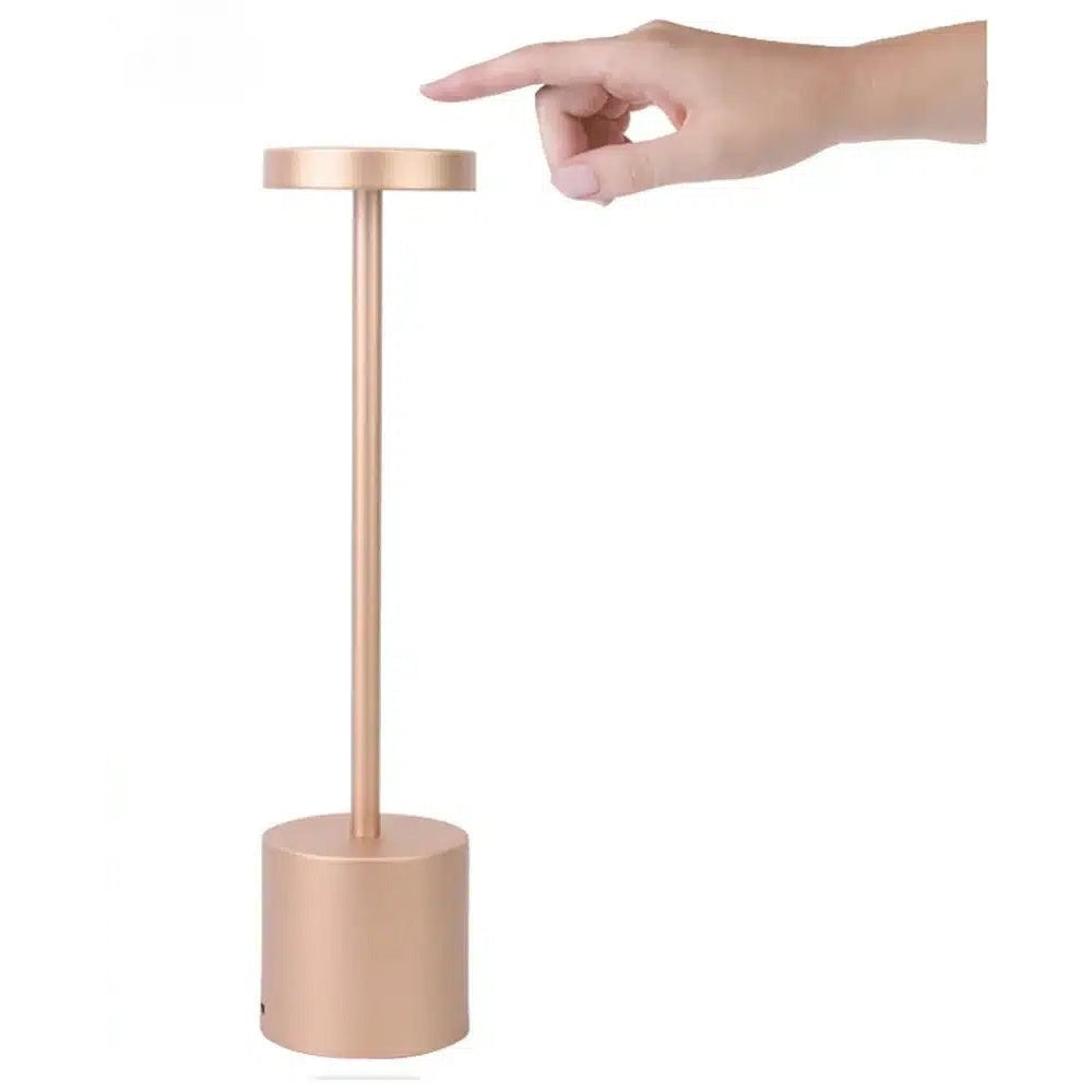 Lampe de table tactile rose sur fond blanc, produit au premier plan
