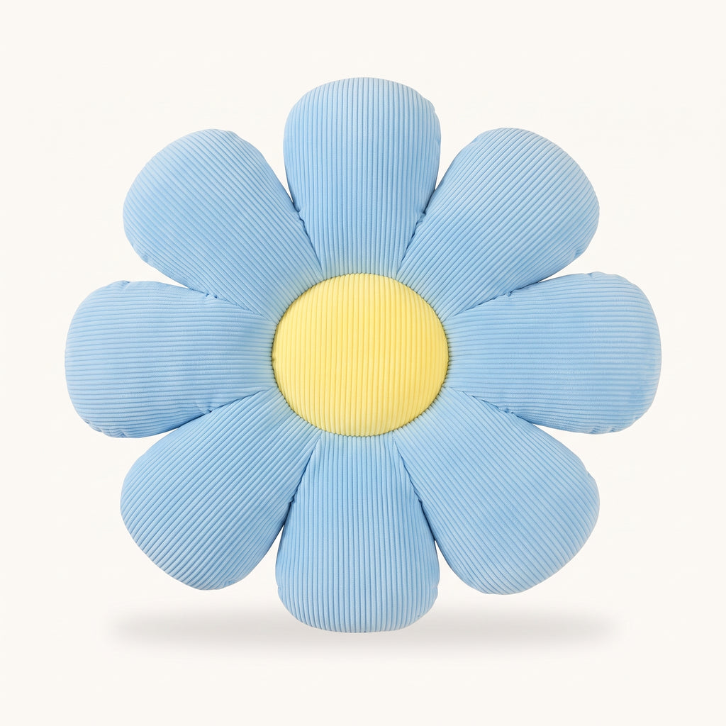 Coussin fleur bleu a huit petales sur fond uni