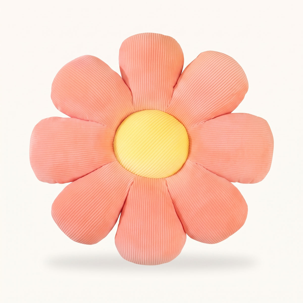 Coussin fleur rose a huit petales sur fond uni