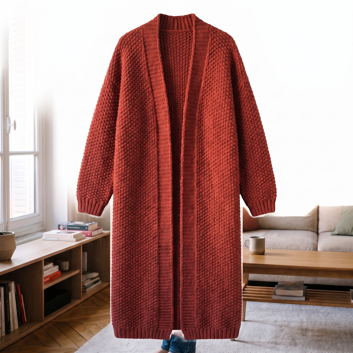 Cardigan long femme rouge brique chiné, point mousse, présenté seul sur fond blanc