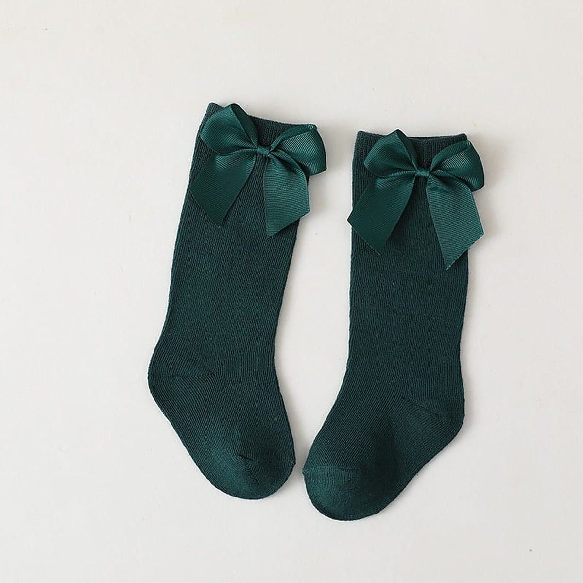 Paire de chaussettes hautes vert sapin a grand noeud pour enfant