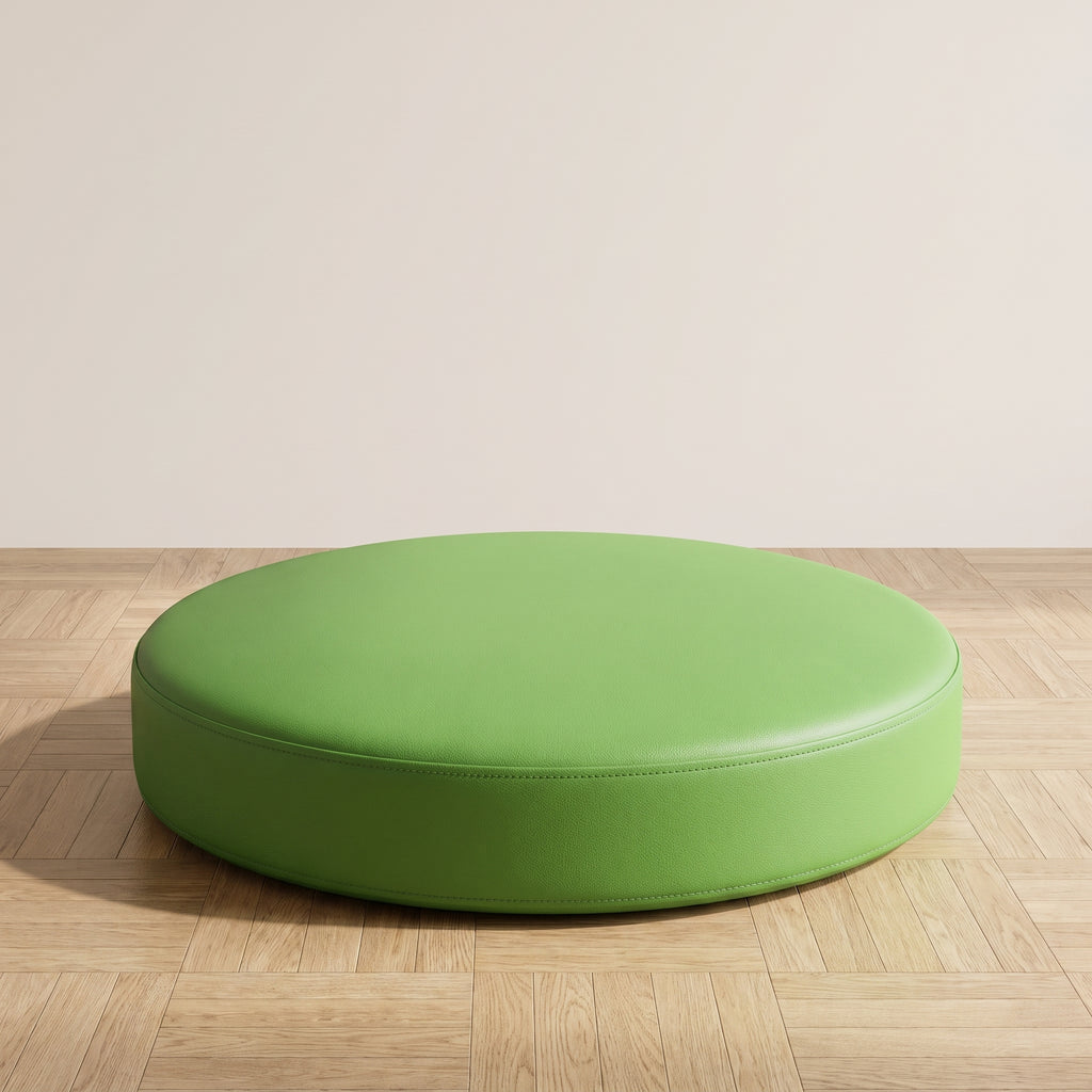 Coussin de sol rond en simili cuir vert