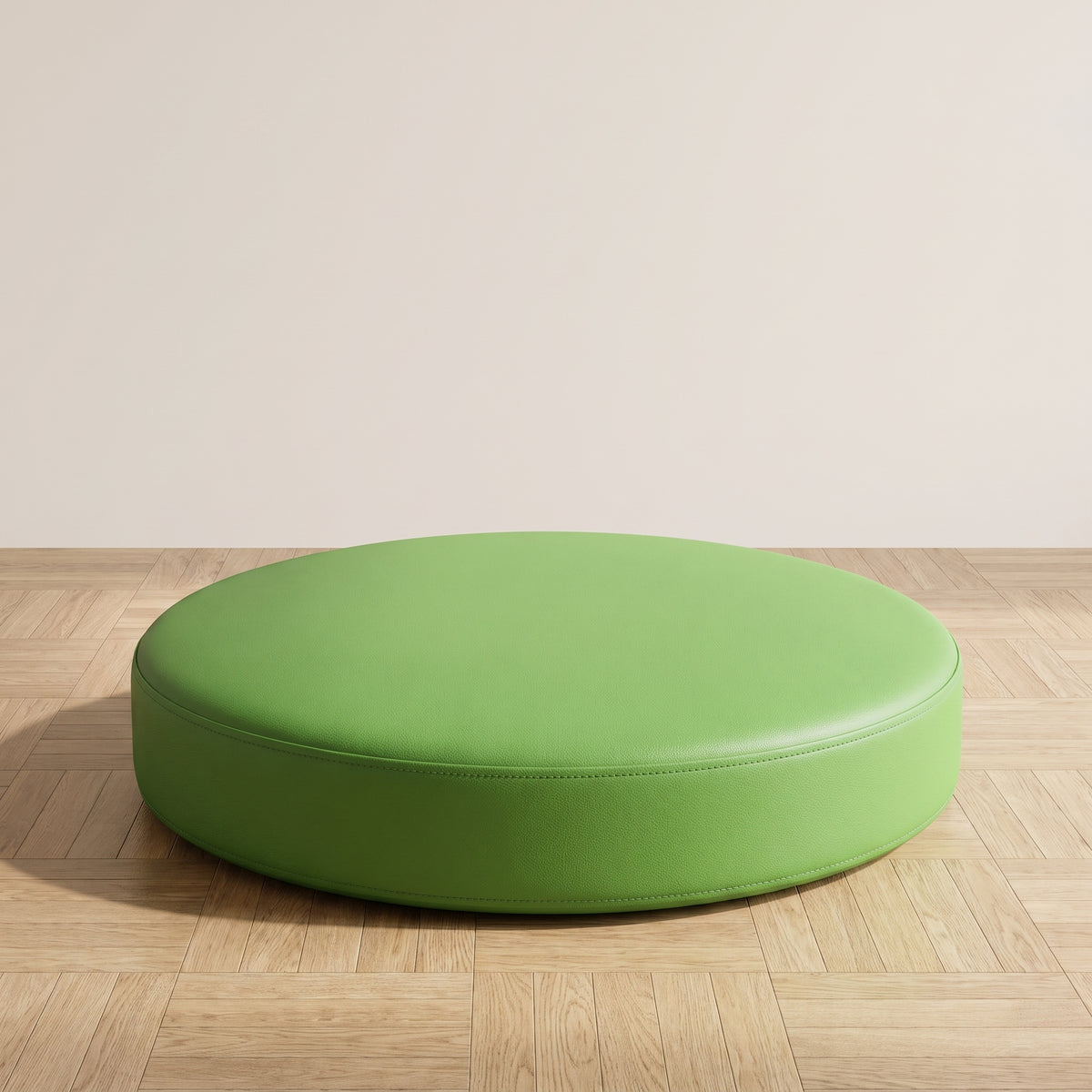 Coussin de sol rond en simili cuir vert