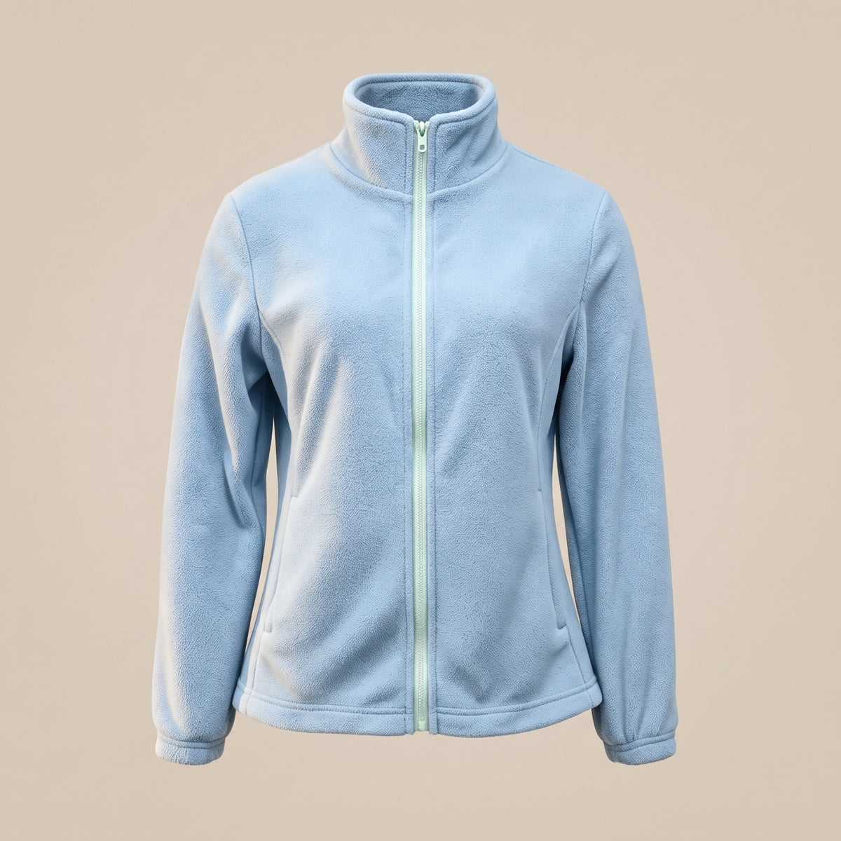 Veste polaire femme bleu ciel zippée en volume sur fond uni Image