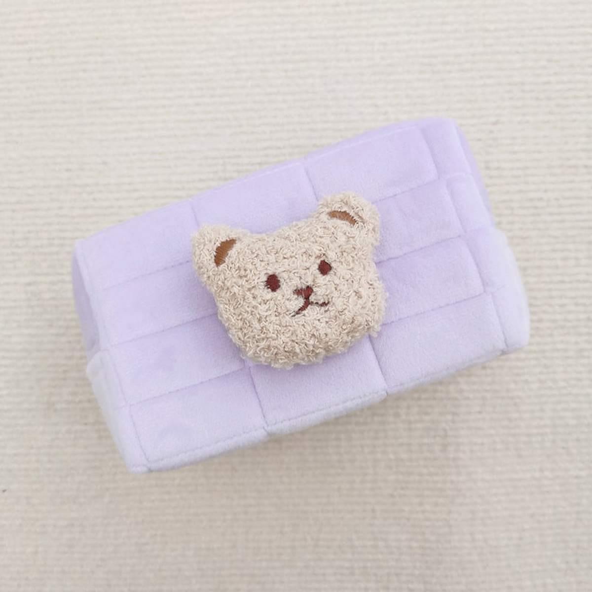 Trousse de toilette matelassée violet